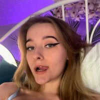 ZoeMils fully nude stripping on cam for online porn video show