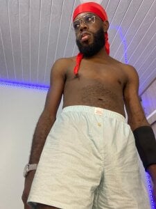 Jacksonking27 my cock is so big it doesn't fit in my shorts Pic
