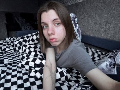 TeraHoman lying in bed) Pic 2