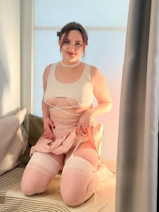 Lella_Ryann_ girl in a miniskirt and stockings Pic 2