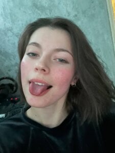 CutieAnny Showing my tongue Pic 6