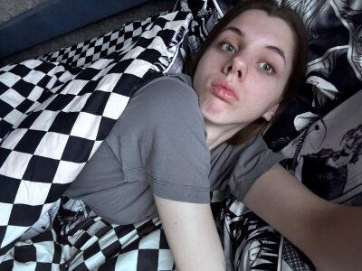 TeraHoman lying in bed) Pic