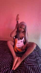 YummyMelanin117 Playing with my guitar Pic 8