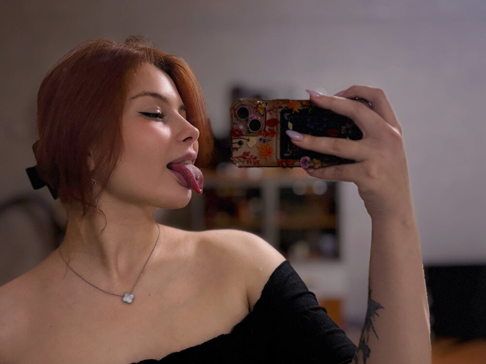 livestrip-joy.com ammyrich1 livesex profile in red-hair cams