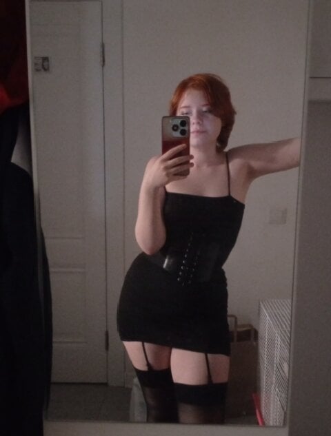 onaircams.com honeyerica livesex profile in red-hair cams